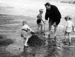 Howard, Michael, Bill and Ingrid Holdsworth at Sandsend, ca 1953