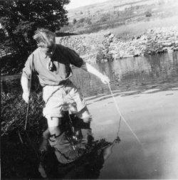 Bill Holdsworth, fishing for minnows in the Wharfe, 1946