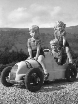 Children in the toy racing car Scargill