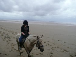 Riding on the beach  at Bream Sands, Somerset