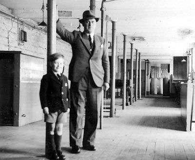 John Birtwhistle with father in Contract Department, 1948