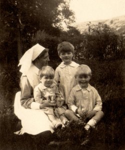 John, Michael and Bill Holdsworth with nurse, 1923