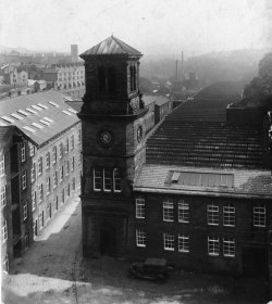 The Clock Tower and weaving sheds at Shaw Lodge Mills, Halifax, 1933