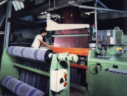 Manir Ahmed, weaving Van de Wiele Loom