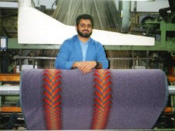 Fazal Ahmed, pulling-in yarn on loom A01, 1998
