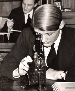 Michael Holdsworth at the science schools, Harrow, J. Smith-Carrington behind, ca. 1937