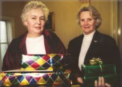 Rosemary receiving her gifts from  Mrs. Holdsworth